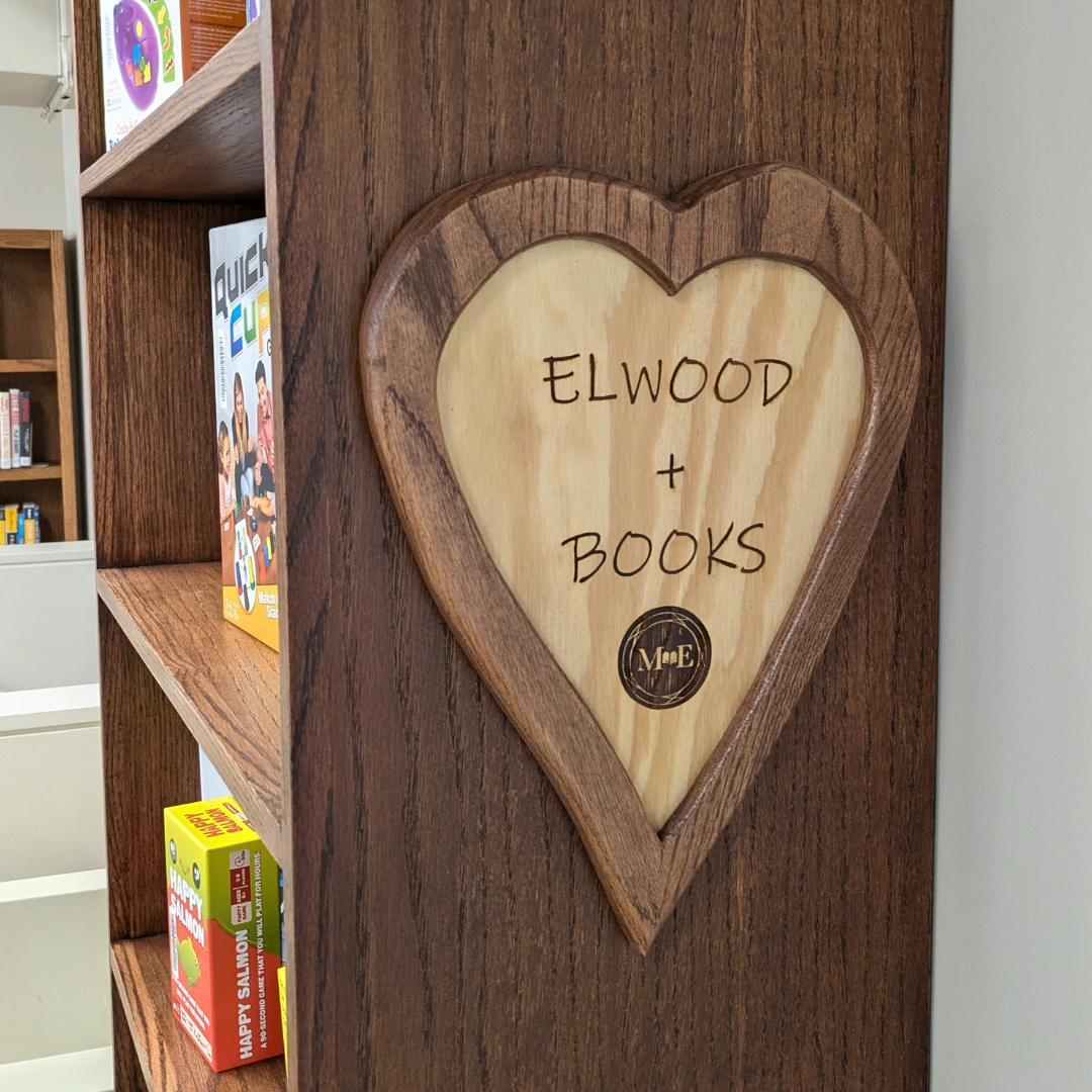 Image of the side of the Elwood Tree Shelf holding the library of things